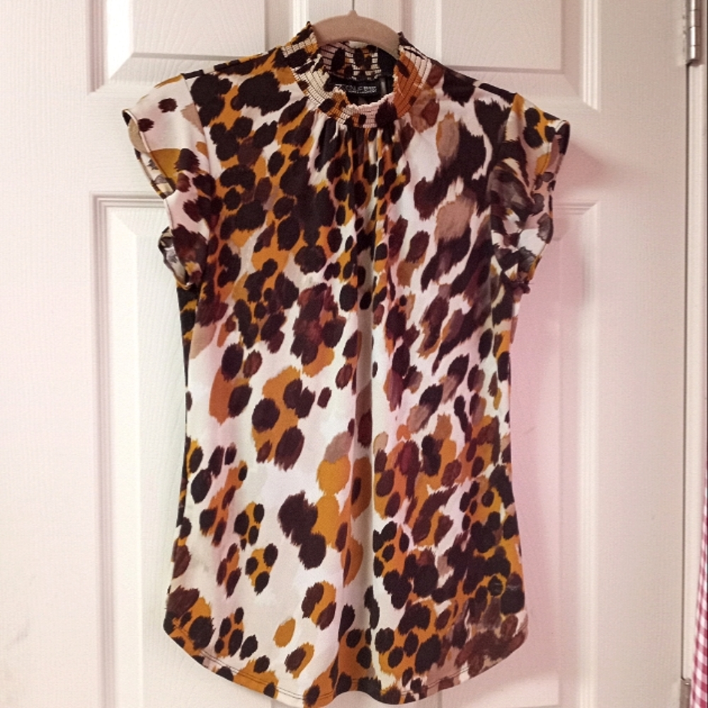 Turtle neck blouse. Short sleeve, great condition